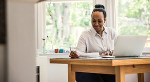 Woman working on laptop for her tax